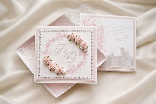 Luxury Peckforton Castle wedding invitations in Cheshire featuring a handmade presentation box, sparkle fabric wrap and layered blush stationery