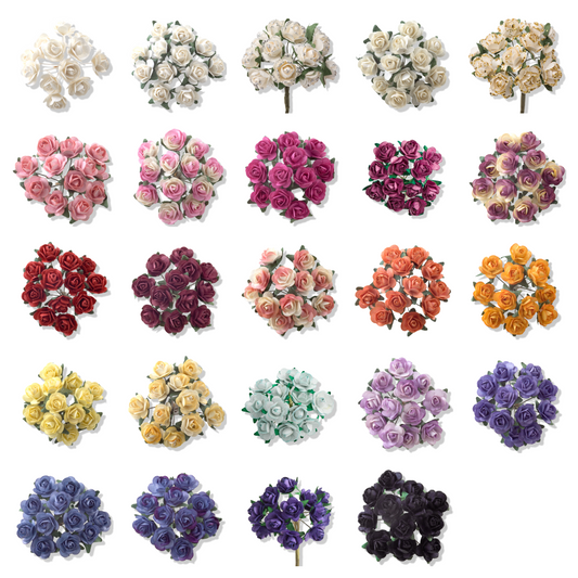 Selection of 15mm paper tea rose flowers in a range of colours for wedding stationery, card making and crafts