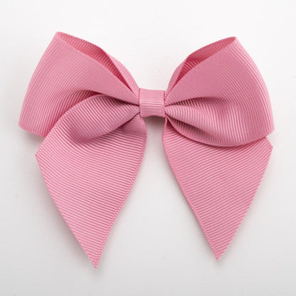 Antique Pink 10cm self-adhesive grosgrain ribbon bow on a white background
