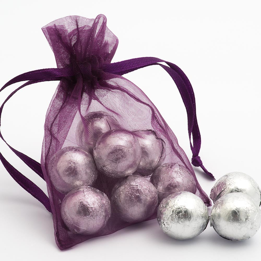 Aubergine organza wedding favour bag filled with sweets