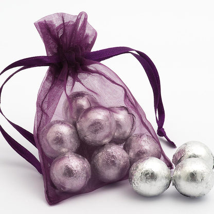 Aubergine organza wedding favour bag filled with sweets