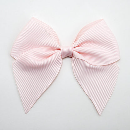 Blush Pink 10cm self-adhesive grosgrain ribbon bow on a white background