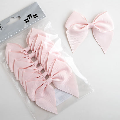 Pack of six blush pink 10cm self-adhesive grosgrain ribbon bows