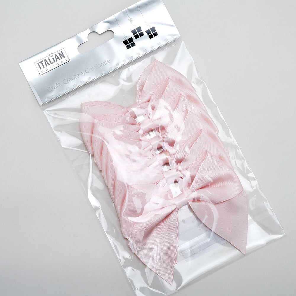 Blush pink self-adhesive satin gift bows in retail packaging