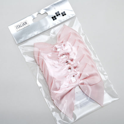 Blush pink self-adhesive satin gift bows in retail packaging
