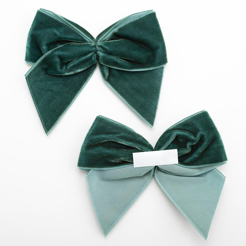 Front and back of bottle green 10cm velvet bows showing the self-adhesive strip