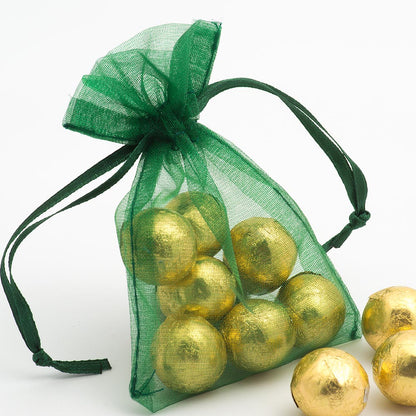 Bottle Green organza wedding favour bag filled with sweets