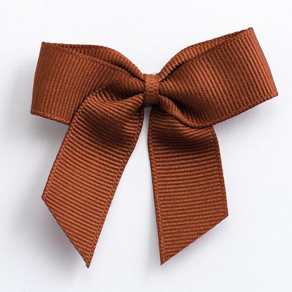 Brown 5cm self-adhesive grosgrain ribbon bow on a white background