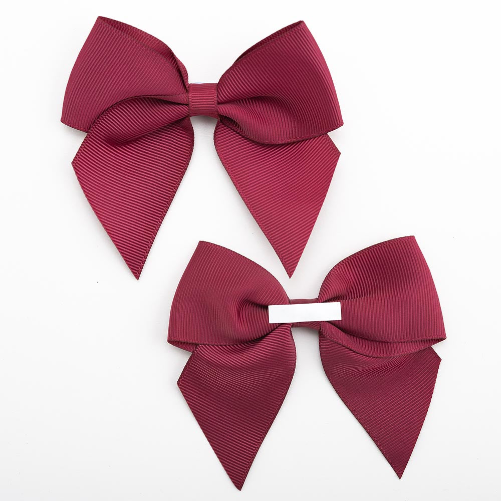 Front and back of burgundy 10cm grosgrain bow showing the self-adhesive strip