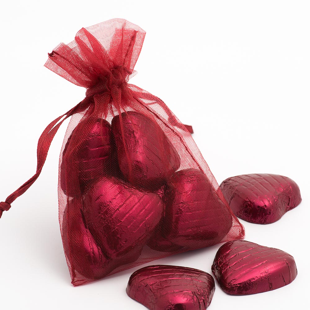 Burgundy organza wedding favour bag filled with sweets