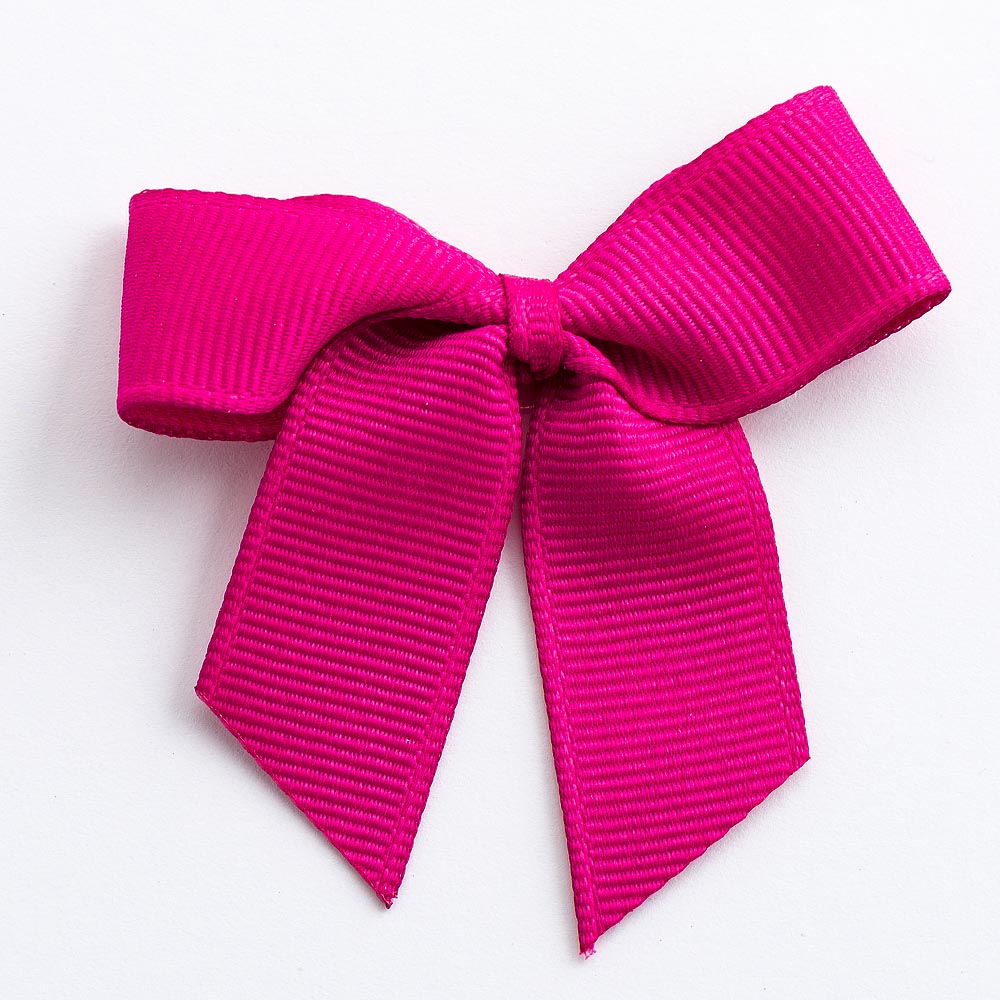 Cerise 5cm self-adhesive grosgrain ribbon bow on a white background