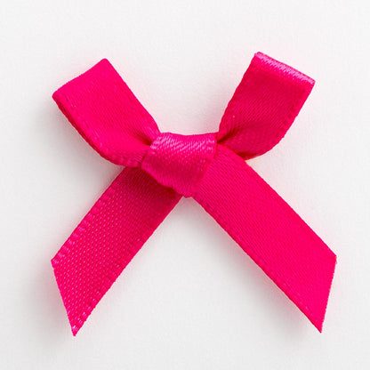 Cerise mini satin ribbon bow made from 6mm ribbon, approximately 3cm wide