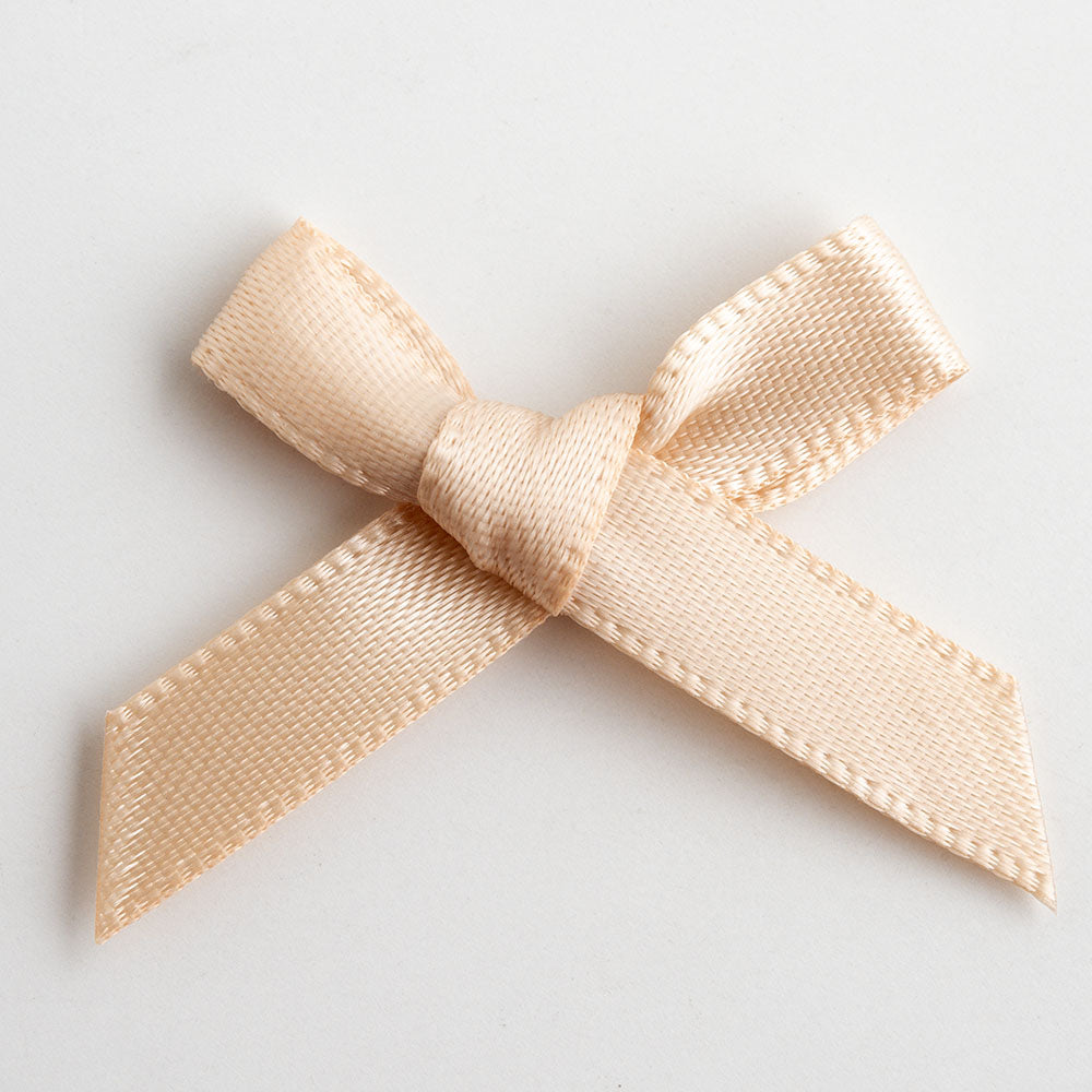 Champagne Gold mini satin ribbon bow made from 6mm ribbon, approximately 3cm wide