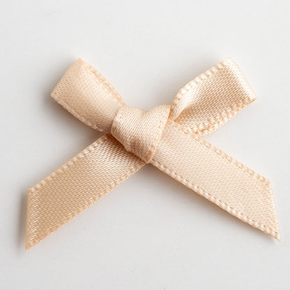 Champagne Gold mini satin ribbon bow made from 6mm ribbon, approximately 3cm wide