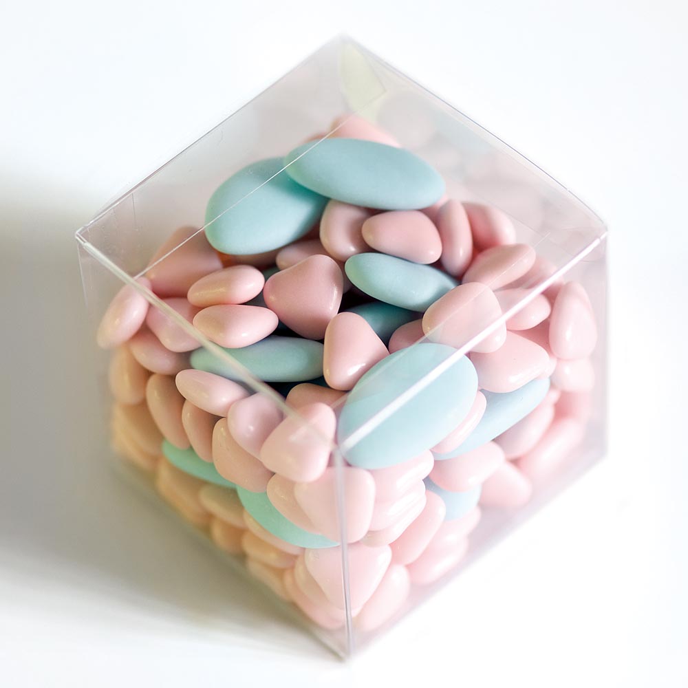 Clear 70mm cube wedding favour box filled with pink and blue sugared almonds