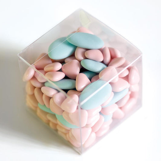 Clear 70mm cube wedding favour box filled with pink and blue sugared almonds