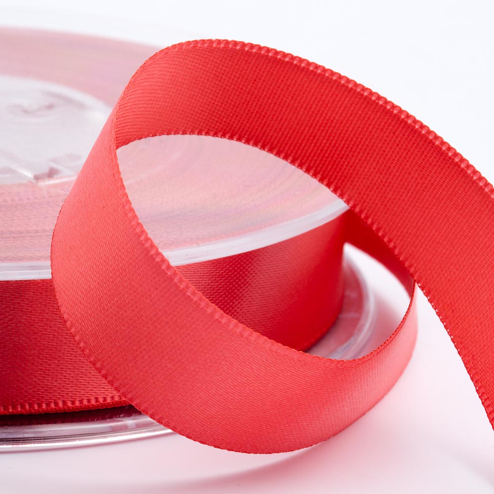 Coral double-sided satin ribbon available in widths from 3mm to 50mm