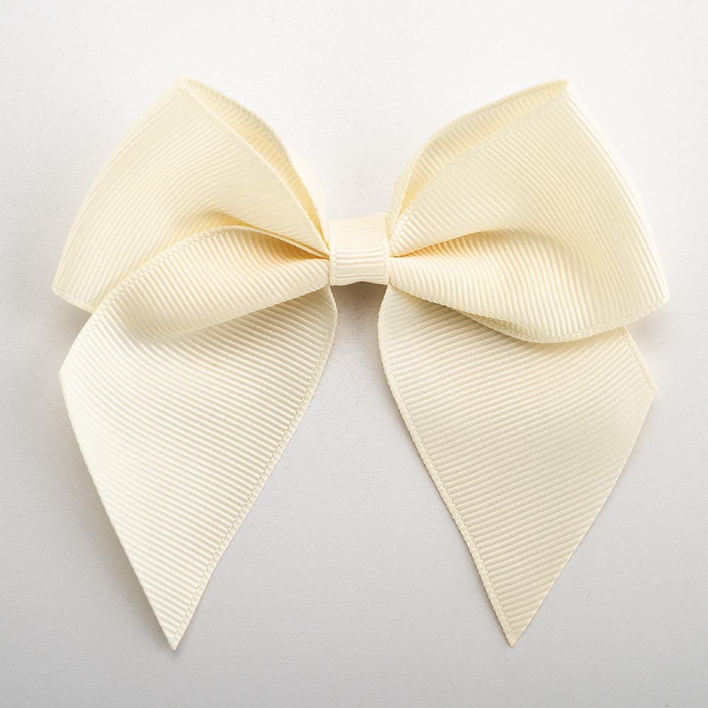 Cream 10cm self-adhesive grosgrain ribbon bow on a white background
