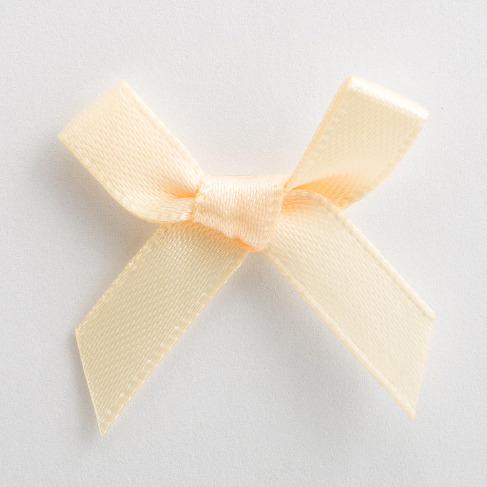 Cream mini satin ribbon bow made from 6mm ribbon, approximately 3cm wide