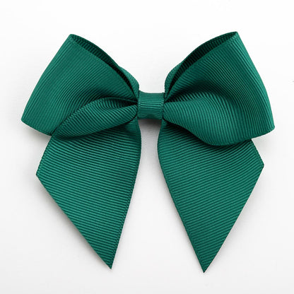 Dark Green 10cm self-adhesive grosgrain ribbon bow on a white background