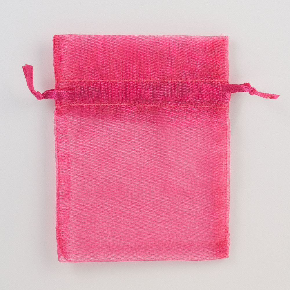 Fuchsia small organza wedding favour bag measuring 7.5 x 10cm