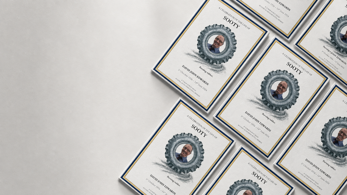 Several personlised funeral order of service covers arranged diagonally on a light gray surface. The cards feature a circular gear-like frame around a small portrait photo and the name 'Sooty' prominently at the top.
