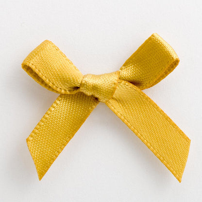 Gold mini satin ribbon bow made from 6mm ribbon, approximately 3cm wide