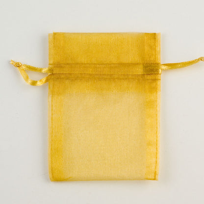 Gold small organza wedding favour bag measuring 7.5 x 10cm