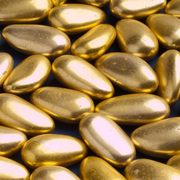 Gold sugared almonds for elegant wedding favours and table settings
