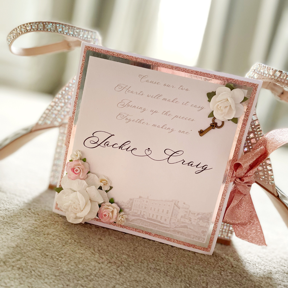 Handmade wedding invitation with paper flowers and image of The Old Palace wedding venue in Chester