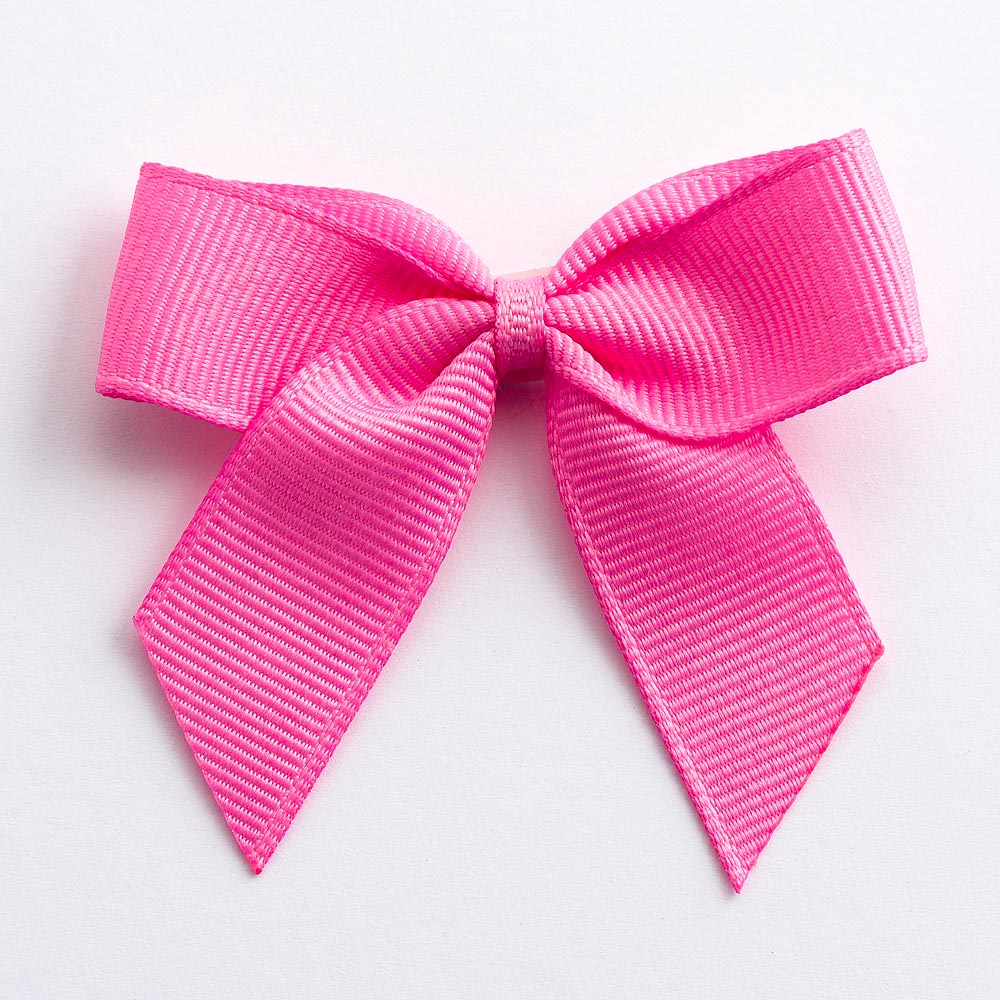 Hot Pink 5cm self-adhesive grosgrain ribbon bow on a white background