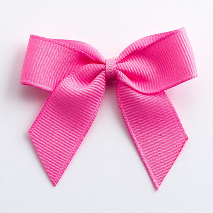 Hot Pink 5cm self-adhesive grosgrain ribbon bow on a white background