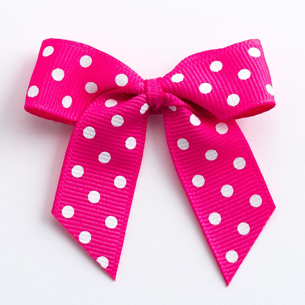 Hot Pink 5cm polka dot grosgrain ribbon bow on a white background