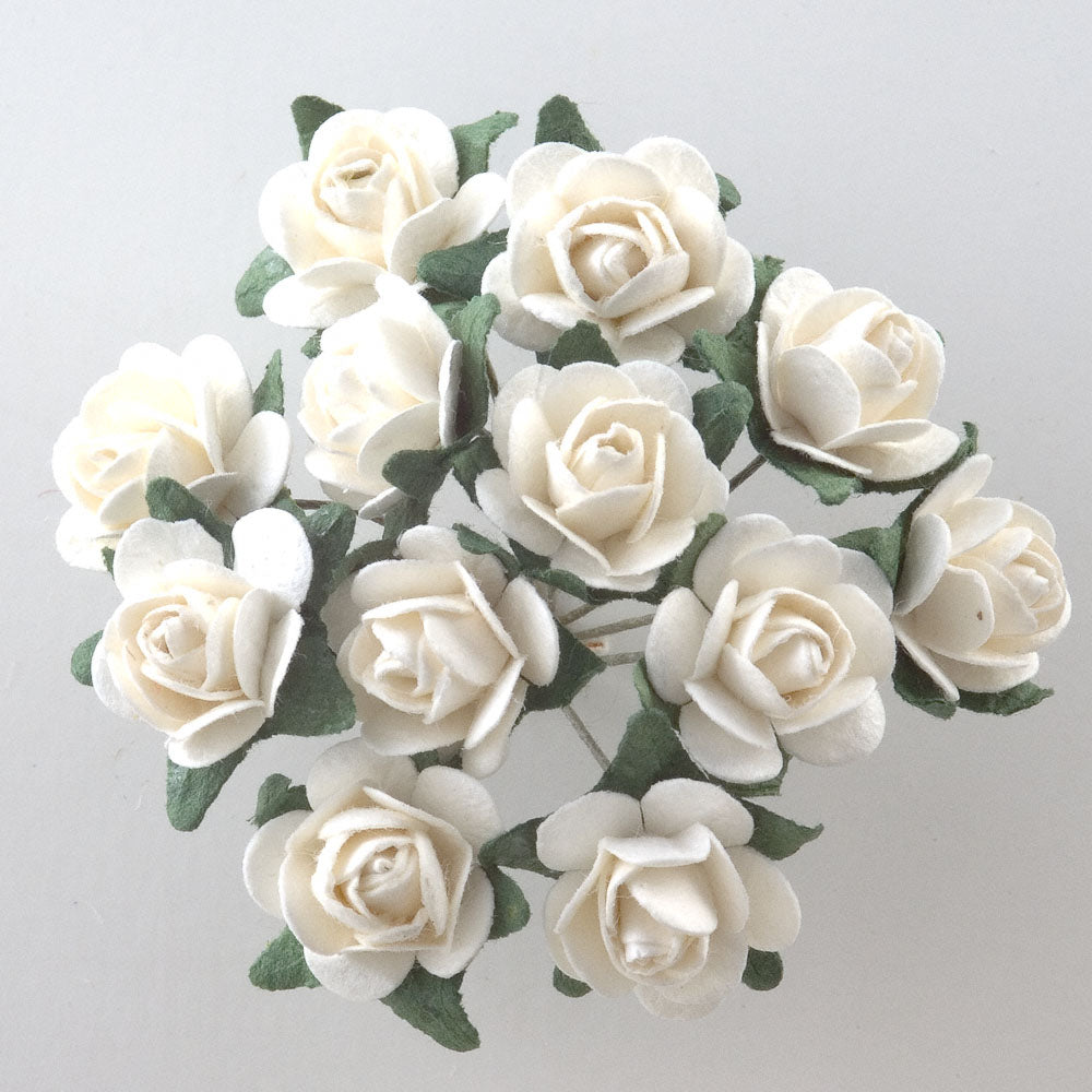 Ivory 15mm paper tea roses with green shading on the petals and wire stems