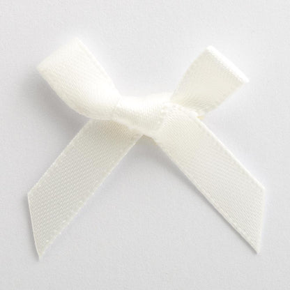 Ivory mini satin ribbon bow made from 6mm ribbon, approximately 3cm wide