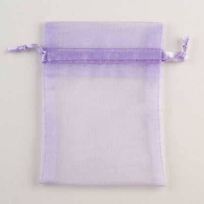 Lilac organza favour bag measuring 10 x 12.5cm