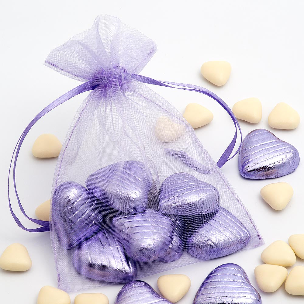 Lilac organza wedding favour bag filled with sweets