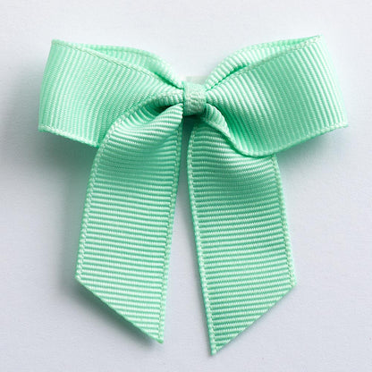 Mint Green 5cm self-adhesive grosgrain ribbon bow on a white background