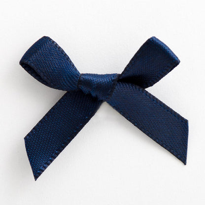Navy mini satin ribbon bow made from 6mm ribbon, approximately 3cm wide