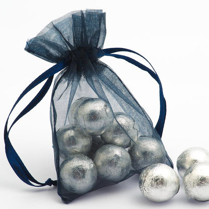 Navy organza wedding favour bag filled with sweets