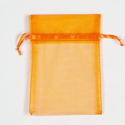 Orange organza favour bag measuring 10 x 12.5cm