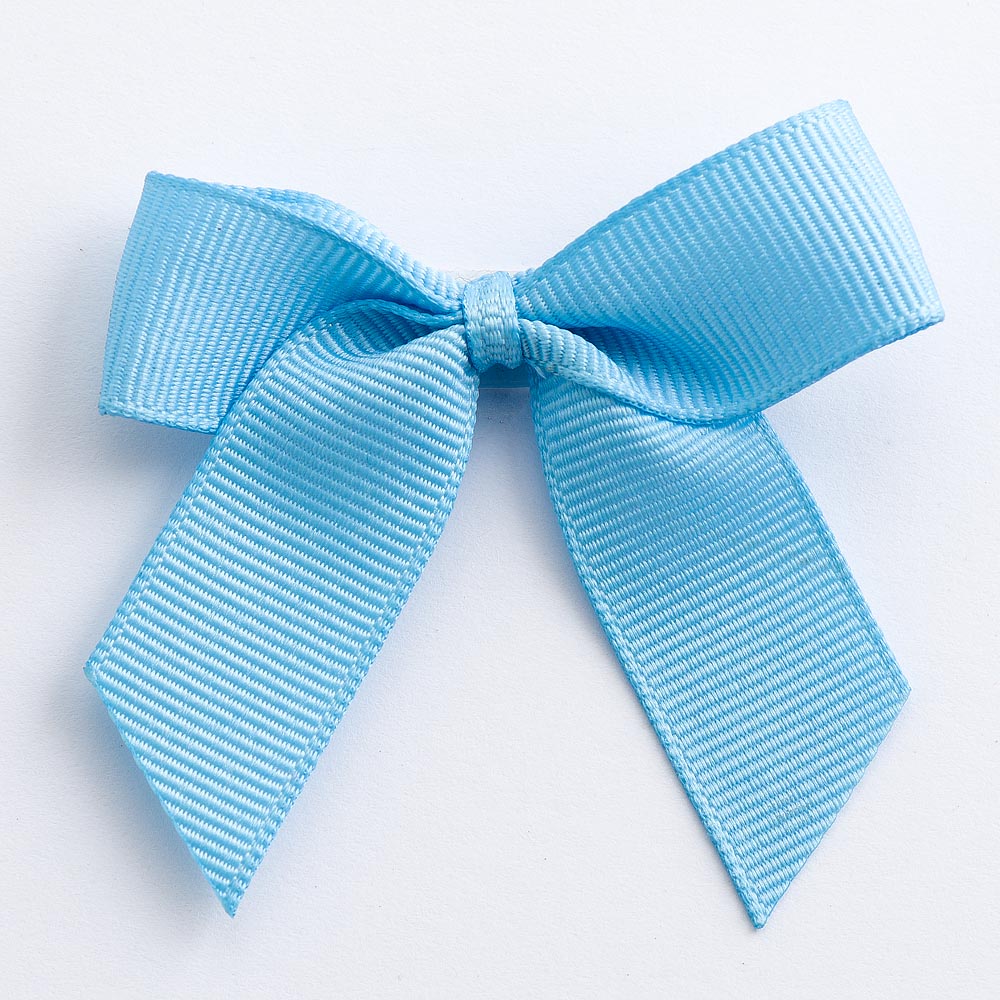 Pale Blue 5cm self-adhesive grosgrain ribbon bow on a white background