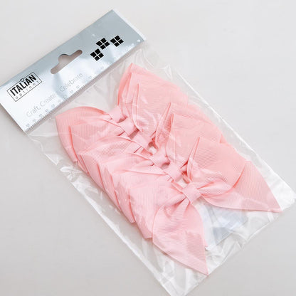 Pack of six pale pink 10cm self-adhesive grosgrain ribbon bows