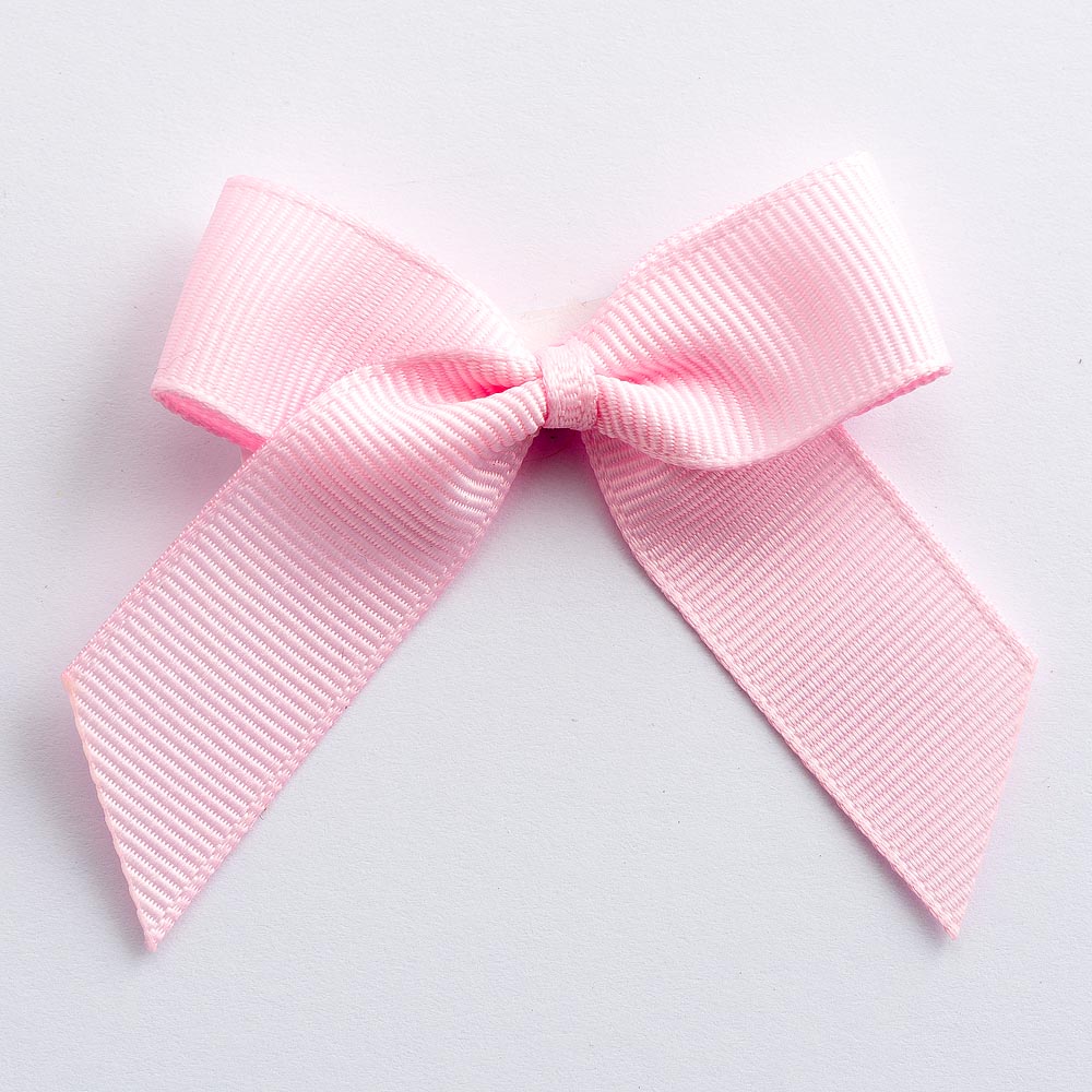 Pale Pink 5cm self-adhesive grosgrain ribbon bow on a white background
