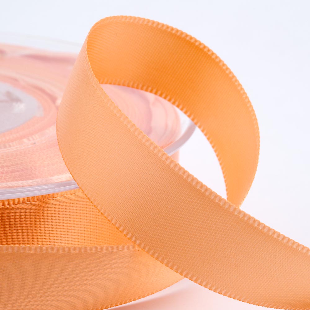Peach double-sided satin ribbon available in widths from 3mm to 50mm