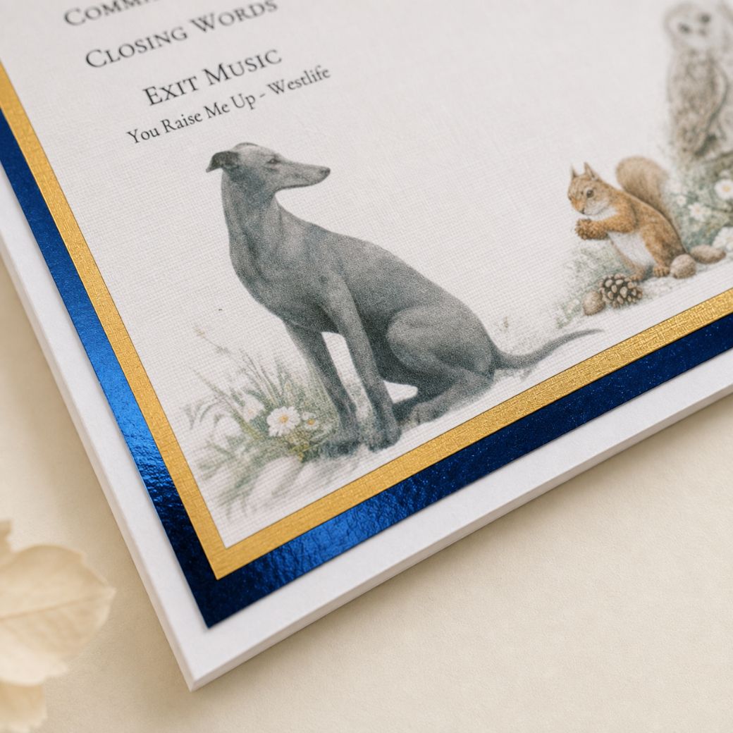 A close-up of a personalised funeral order of service card  featuring a personalised image of a grey dog illustration, a small squirrel, and decorative blue and gold metallic borders on a cream background.