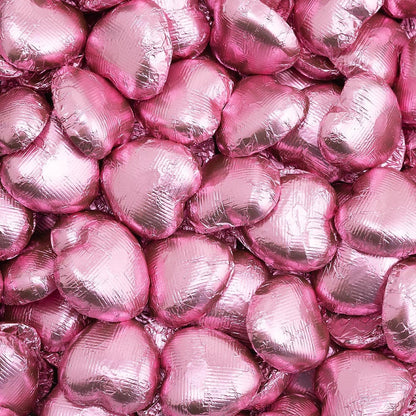 Pink foil heart chocolates for wedding favours and table settings