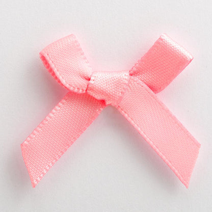 Pink mini satin ribbon bow made from 6mm ribbon, approximately 3cm wide