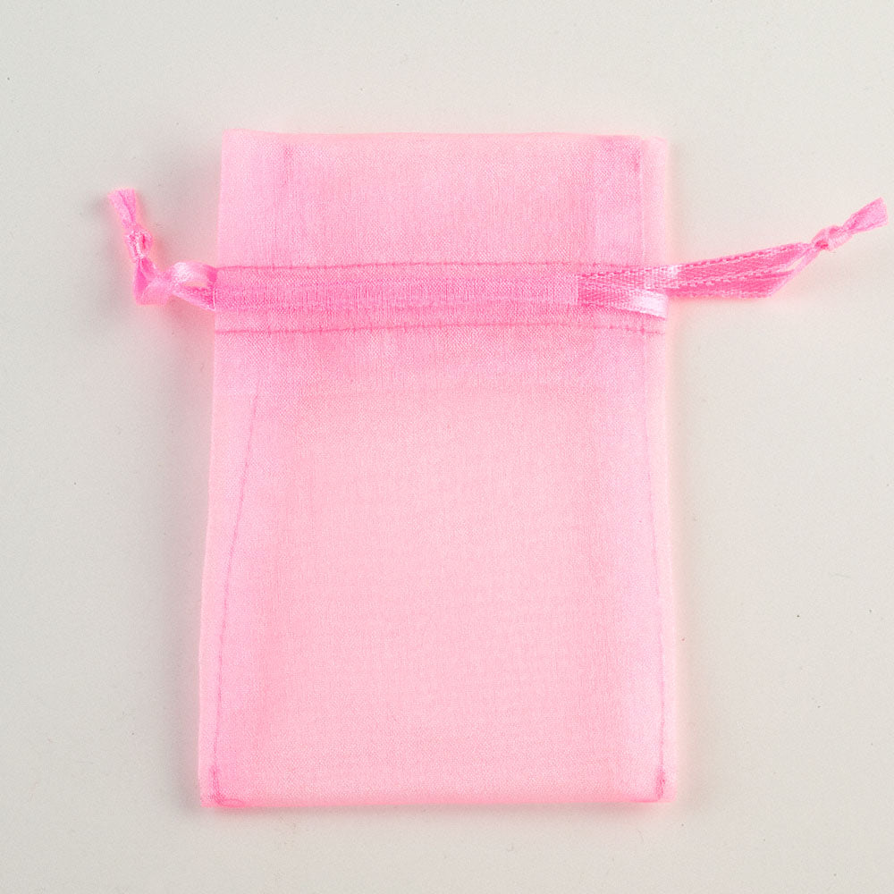 Pink small organza wedding favour bag measuring 7.5 x 10cm