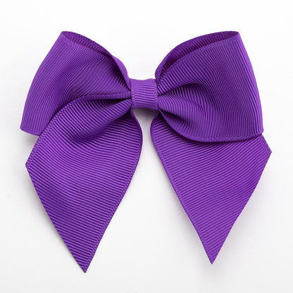 Purple 10cm self-adhesive grosgrain ribbon bow on a white background